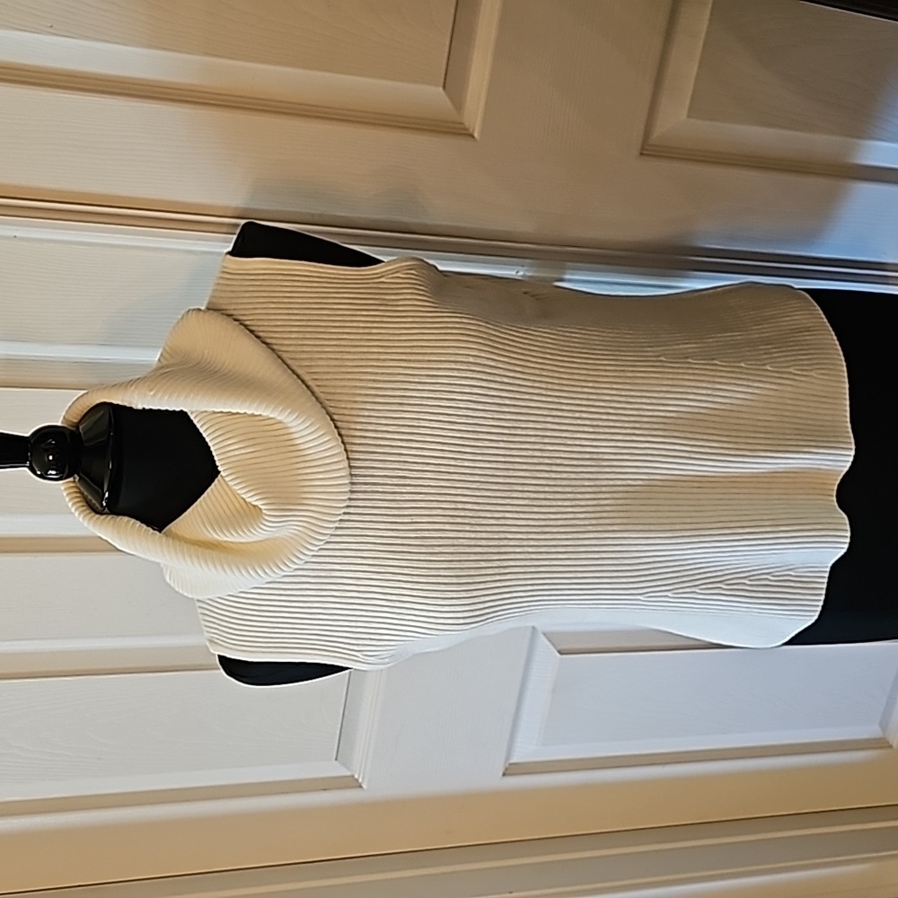 Fred David sleeveless cream sweater.
